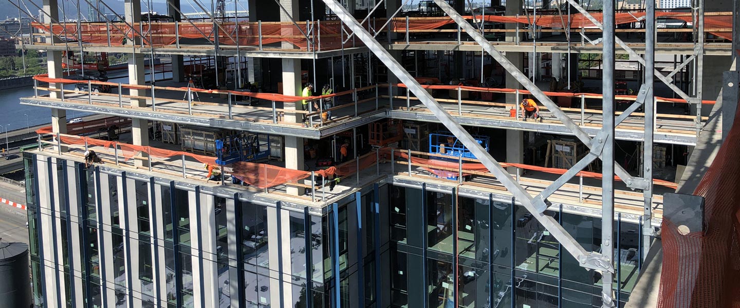 Construction workers in a building in development